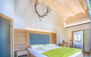 Letto o letti in una camera di Seehotel St Hubertus