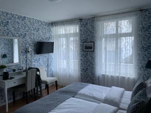Katil atau katil-katil dalam bilik di Nautic Hotell