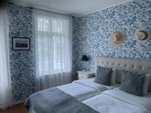 Katil atau katil-katil dalam bilik di Nautic Hotell