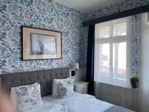 Katil atau katil-katil dalam bilik di Nautic Hotell