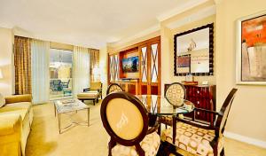 a living room with a couch and a table at Amalz Balcony Suites at Mgm Signature ! in Las Vegas