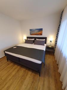 Postel nebo postele na pokoji v ubytování Hotel Neuenfels
