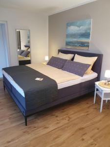 Postel nebo postele na pokoji v ubytování Hotel Neuenfels