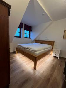 Postel nebo postele na pokoji v ubytování Modrá Hortenzie