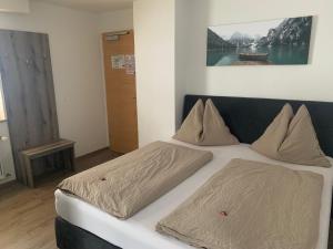 Postel nebo postele na pokoji v ubytování Pension Mühle