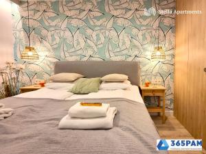 Posteľ alebo postele v izbe v ubytovaní Apartamenty w Gąskach - 365PAM