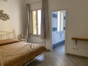Posteľ alebo postele v izbe v ubytovaní Casa Ilva