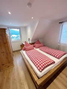 Ένα ή περισσότερα κρεβάτια σε δωμάτιο στο Rohrhardsberg - Stubenhof, Black Forest