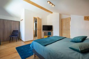 Posteľ alebo postele v izbe v ubytovaní Les 3 Sophies - Magnifique chalet pour 1 à 8 personnes proche des remontées mécaniques des prodains