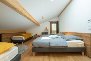 Posteľ alebo postele v izbe v ubytovaní Les 3 Sophies - Magnifique chalet pour 1 à 8 personnes proche des remontées mécaniques des prodains