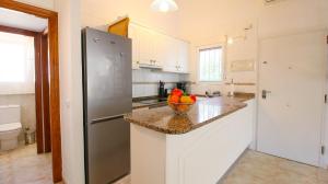 Kuchyň nebo kuchyňský kout v ubytování Residencial El Cortijo