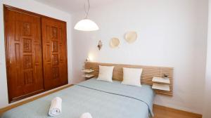 Postel nebo postele na pokoji v ubytování Residencial El Cortijo + 21 fotografií