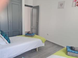 Łóżko lub łóżka w pokoju w obiekcie Fabulous Villa Mabel