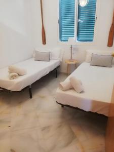 Posteľ alebo postele v izbe v ubytovaní Apartamento en Urbanización Los Enebros