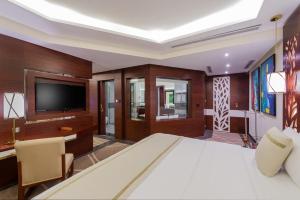 TV a/nebo společenská místnost v ubytování Blue Diamond Hotel Jeddah