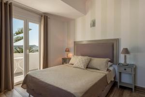 Postel nebo postele na pokoji v ubytování Daedalus Hotel + 37 fotografií