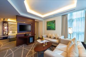TV a/nebo společenská místnost v ubytování Blue Diamond Hotel Jeddah