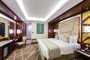 Postel nebo postele na pokoji v ubytování Blue Diamond Hotel Jeddah
