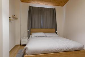 Postel nebo postele na pokoji v ubytování B&B La Camia