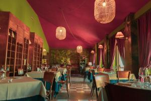 Restoran või mõni muu söögikoht majutusasutuses Carpediem Roma Golf Club