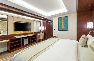 TV a/nebo společenská místnost v ubytování Blue Diamond Hotel Jeddah