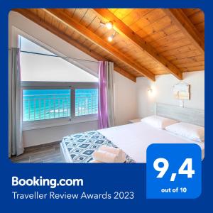 Postel nebo postele na pokoji v ubytování Amore Del Mare + 7 fotografií