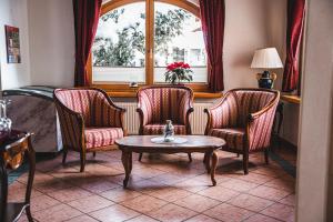Posezení v ubytování Hotel Guesthouse Dalnig