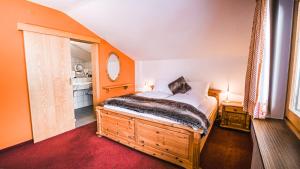 Postel nebo postele na pokoji v ubytování Hotel Guesthouse Dalnig
