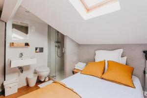Postel nebo postele na pokoji v ubytování Hôtel Taggât