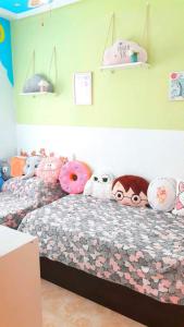 Posteľ alebo postele v izbe v ubytovaní NICE 2-BEDROOMS