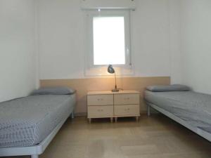 A bed or beds in a room at Delightful apartment surrounded by nature