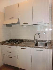 A kitchen or kitchenette at Delightful apartment surrounded by nature