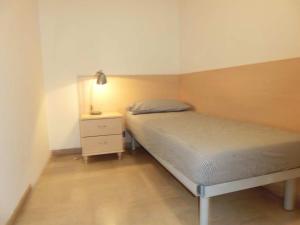 A bed or beds in a room at Delightful apartment surrounded by nature Még 24 kép