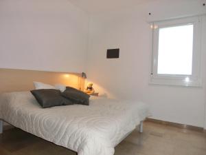 A bed or beds in a room at Delightful apartment surrounded by nature