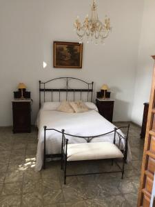 A bed or beds in a room at GBH Casa Quintana