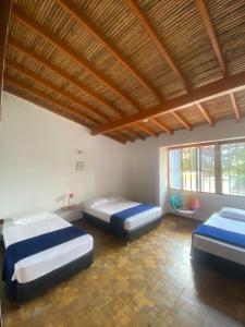 Postel nebo postele na pokoji v ubytování Yolo Hostel Medellin + 37 fotografií