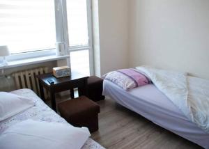 Ośrodek Wczasowy Kraśniczanka tesisinde bir odada yatak veya yataklar