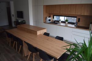 Kuchyň nebo kuchyňský kout v ubytování Apartmány Pod Novou