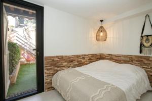 Postel nebo postele na pokoji v ubytování Casa USHUAÏA face au golfe de St-Tropez