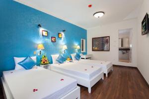 Postel nebo postele na pokoji v ubytování Hanoi Jade Hostel