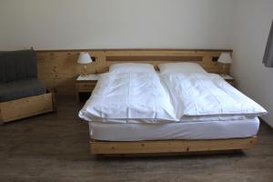 Postel nebo postele na pokoji v ubytování Residence Prapoz