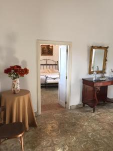 A bed or beds in a room at GBH Casa Quintana