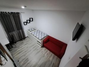 Telewizja i/lub zestaw kina domowego w obiekcie HostelHollabrunn