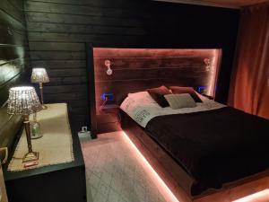 Postel nebo postele na pokoji v ubytování Costa del Dyrsfjorden