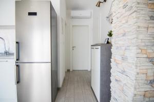 Kuchyňa alebo kuchynka v ubytovaní Apartments Up&Up