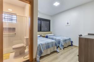 Postel nebo postele na pokoji v ubytování Hotel Lisbor