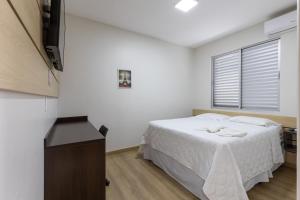 Postel nebo postele na pokoji v ubytování Hotel Lisbor