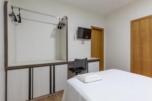 TV a/nebo společenská místnost v ubytování Hotel Lisbor