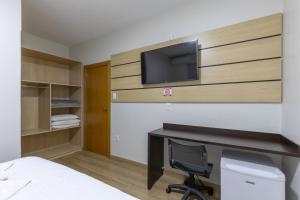 TV a/nebo společenská místnost v ubytování Hotel Lisbor