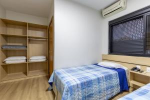 Postel nebo postele na pokoji v ubytování Hotel Lisbor